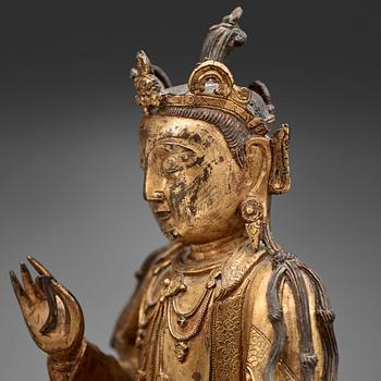 A gilt bronze figure of Guanyin, Ming dynasty (1368-1644).