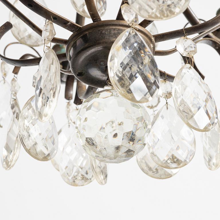 A Rococo.style chandelier, first half of the 20th century.