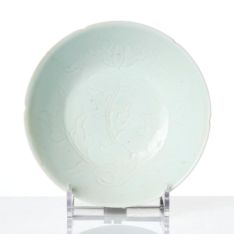 A carved qingbai foliate bowl, Song dynasty (960-1279).