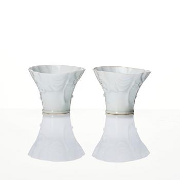 A pair of blanc de chine libation cups, Qing dynasty, 19th Century.