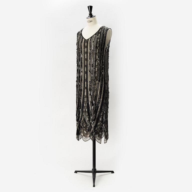 A sequin and pearl-embroidered 1920's dress.
