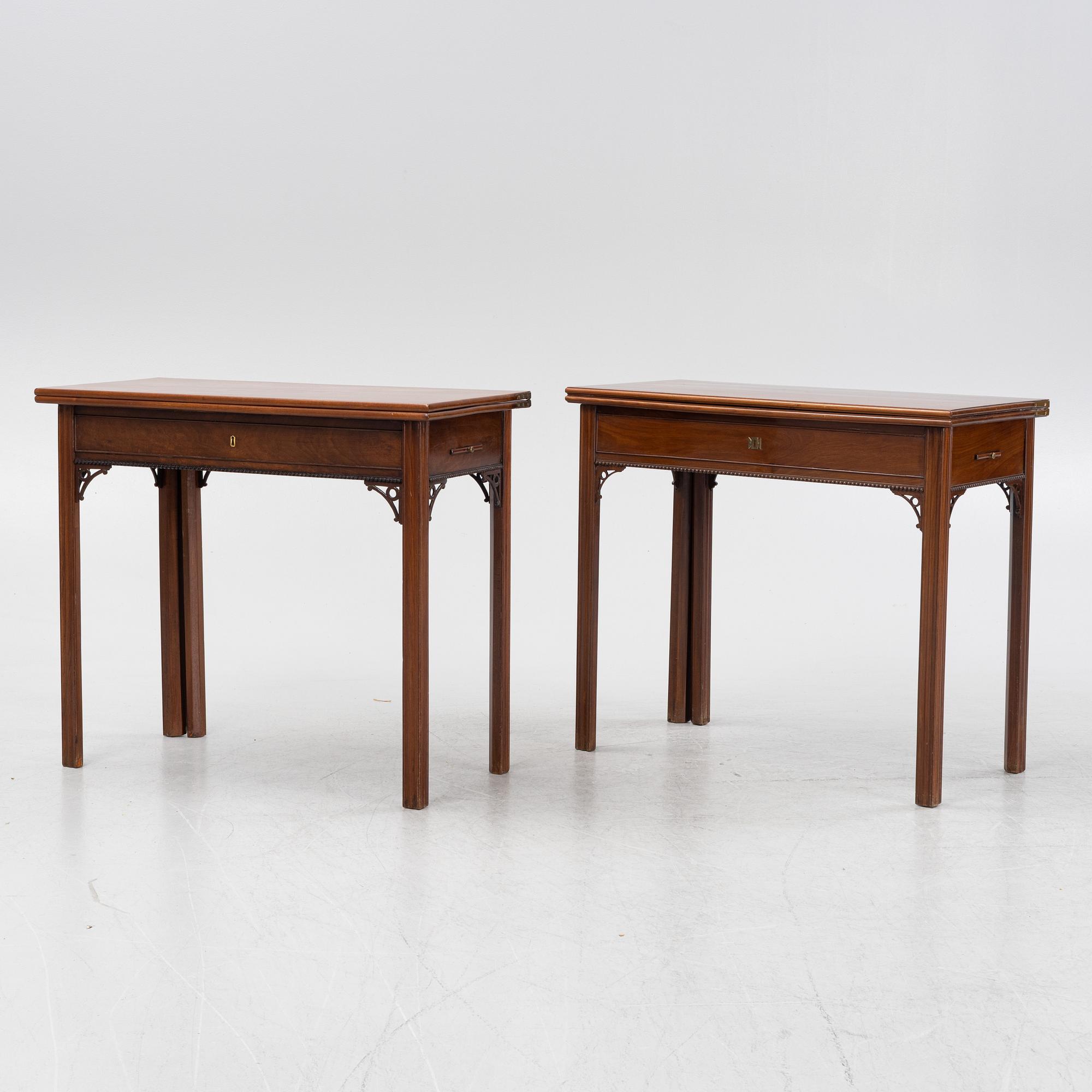 A macthed pair of late Gustavian mahogany veneered card tables one by C D Fick, Stockholm 1776-1806.