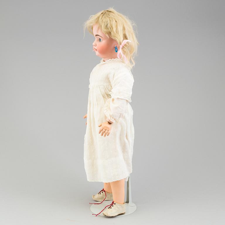 a porcelain doll from the 1920's.