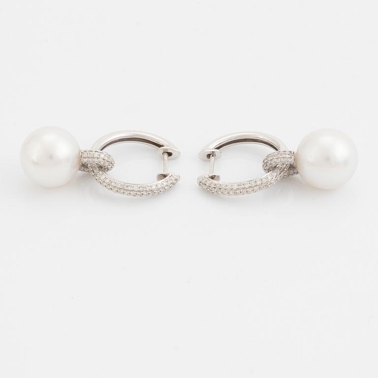 Pearl and brilliant cut diamond earrings.