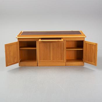 An oak writing desk by Finn N Hansen. End of the 20th Century.