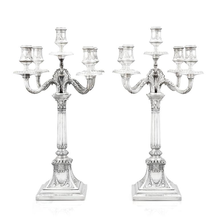 A pair of Swedish silver candelabras, mark of Svea Svensson, Stockholm 1908.