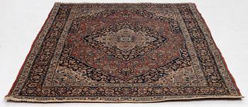 An oriental rug, c. 180 x 140 cm.