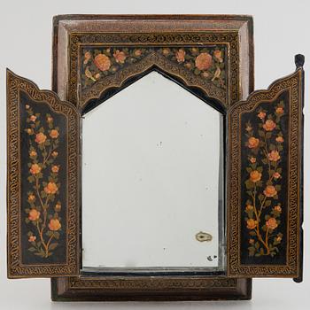 A Persian papier-maché mirror, first half of the 20th century.