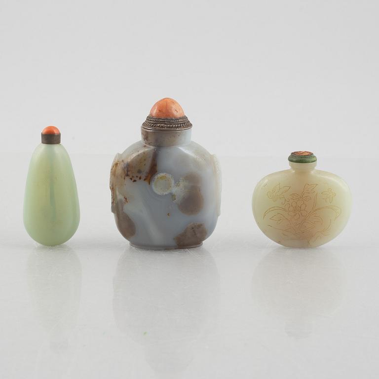 A group of three Chinese stone snuffbottles, 20th century.