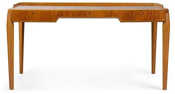 A Carl-Axel Acking mahogany and walnut desk, Sweden 1940's-50's.