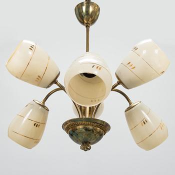 A mid-20th-century brass ceiling light, Finland.