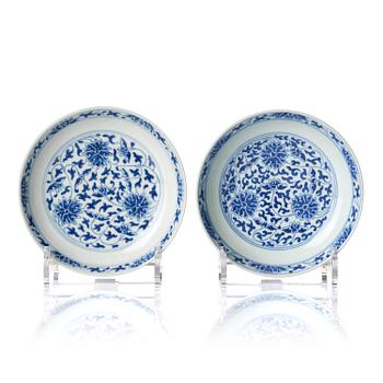 A pair of blue and white 'lotus' dishes, Qing dynasty with Daoguang mark and of the period (1821-50).