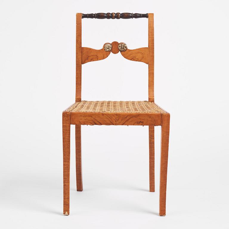 An Empire chair, first half of the 19th century.