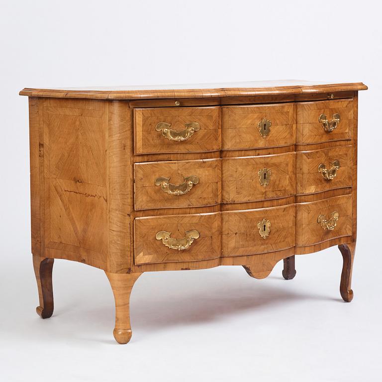 A late Baroque walnut-veneered chest of drawers attributed to J. H. Fürloh (master in Stockholm 1724-1745).