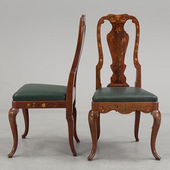 A pair of dutch rococo style chairs, first half of the 29th century.