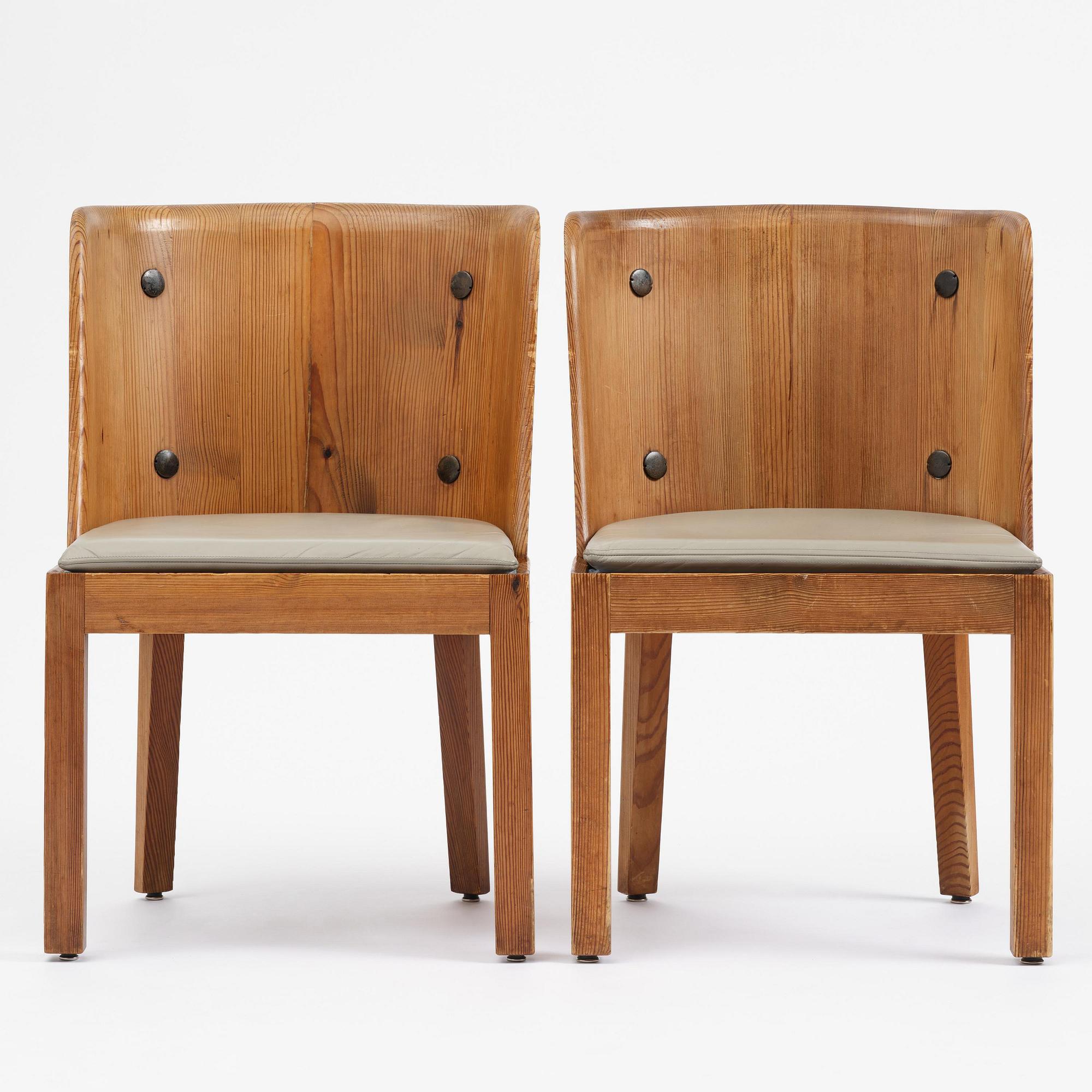 Axel Einar Hjorth, a pair of stained pine "Lovö" armchairs, Nordiska Kompaniet, Sweden, 1930s.