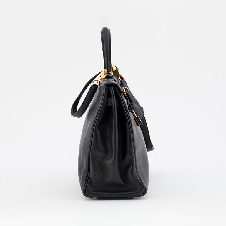 HERMÈS, a black calf leather handbag, "Kelly 35".