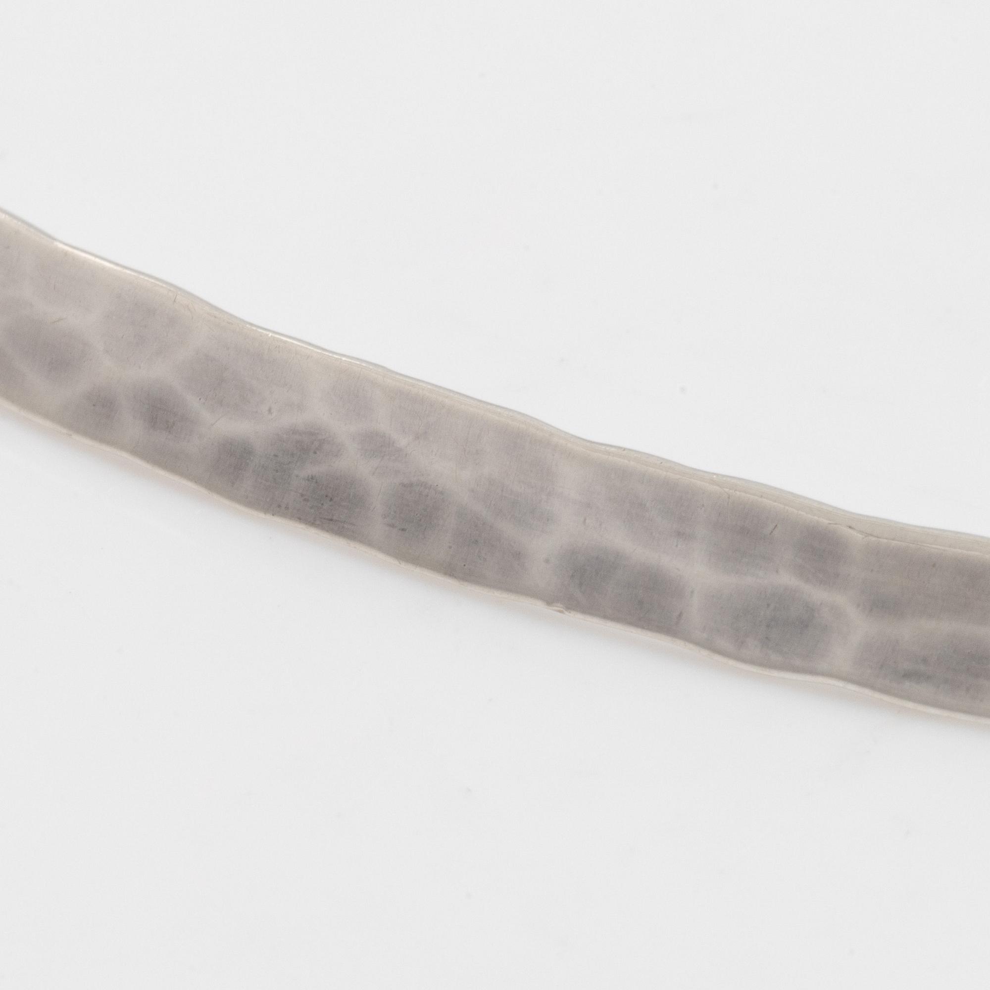 Annie Jägbeck silver necklace and earrings.