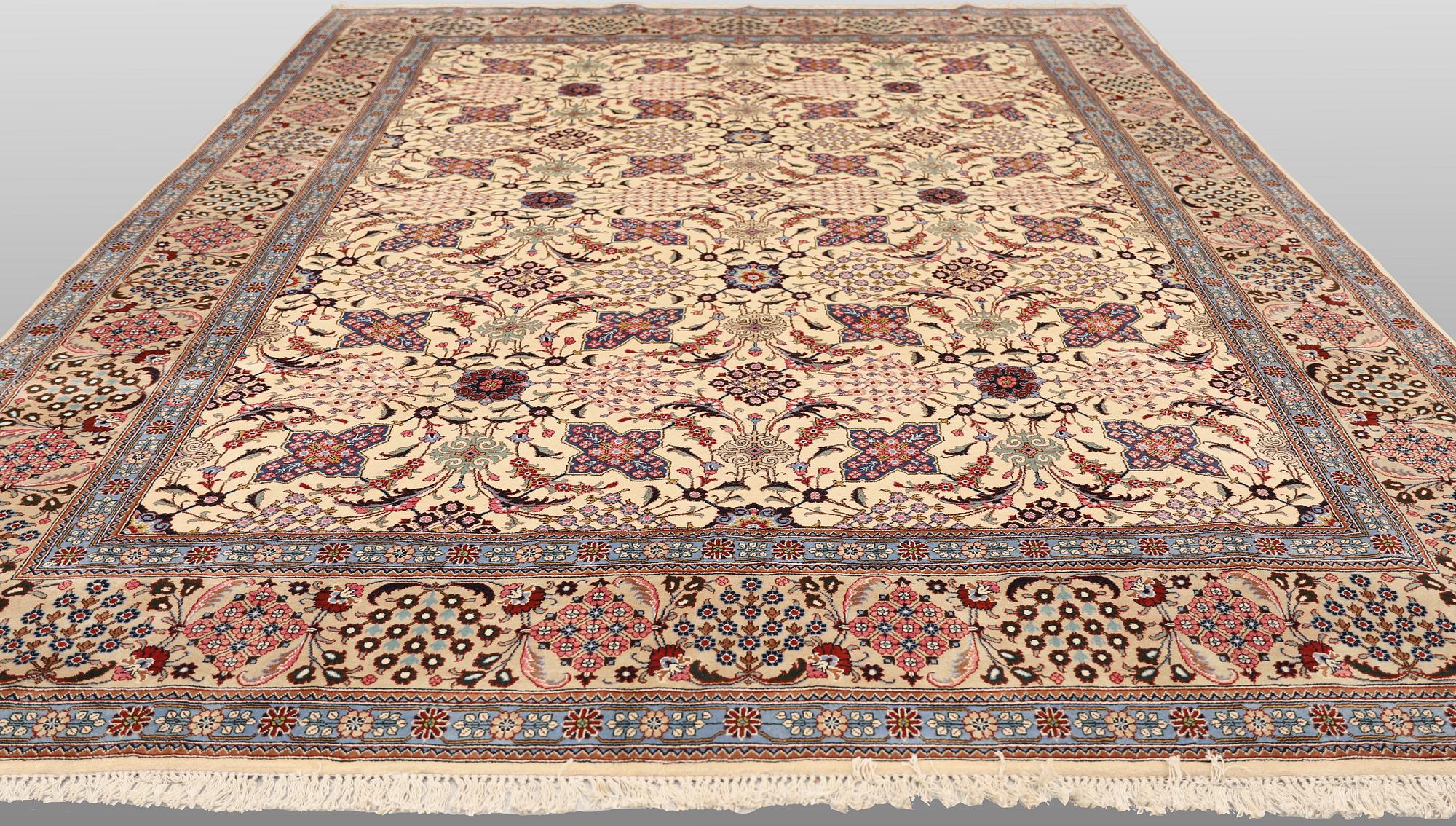 A Keshan carpet, approx. 407 x 290 cm.
