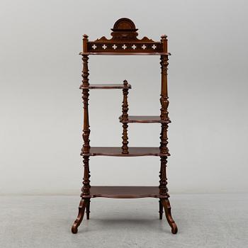 A mid 20th century mahogany etagere.