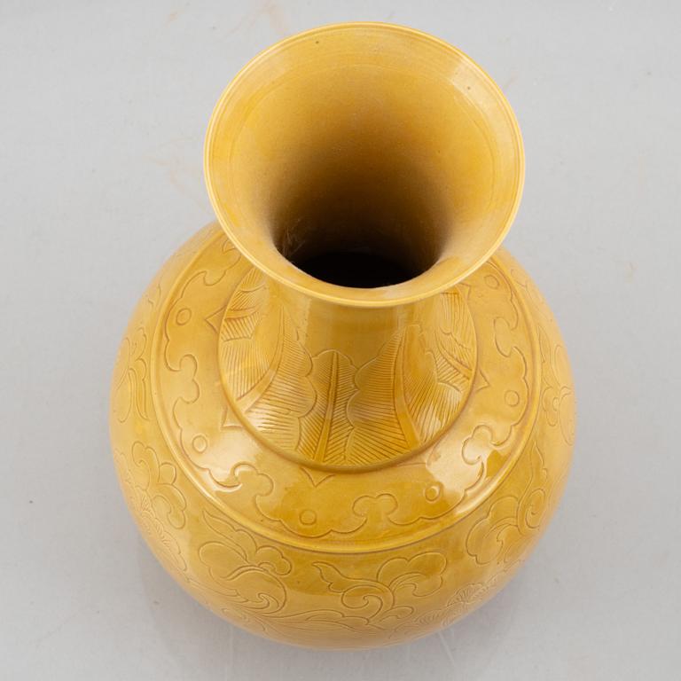 Two Chinese yellow glazed ceramic vases, 20th century.