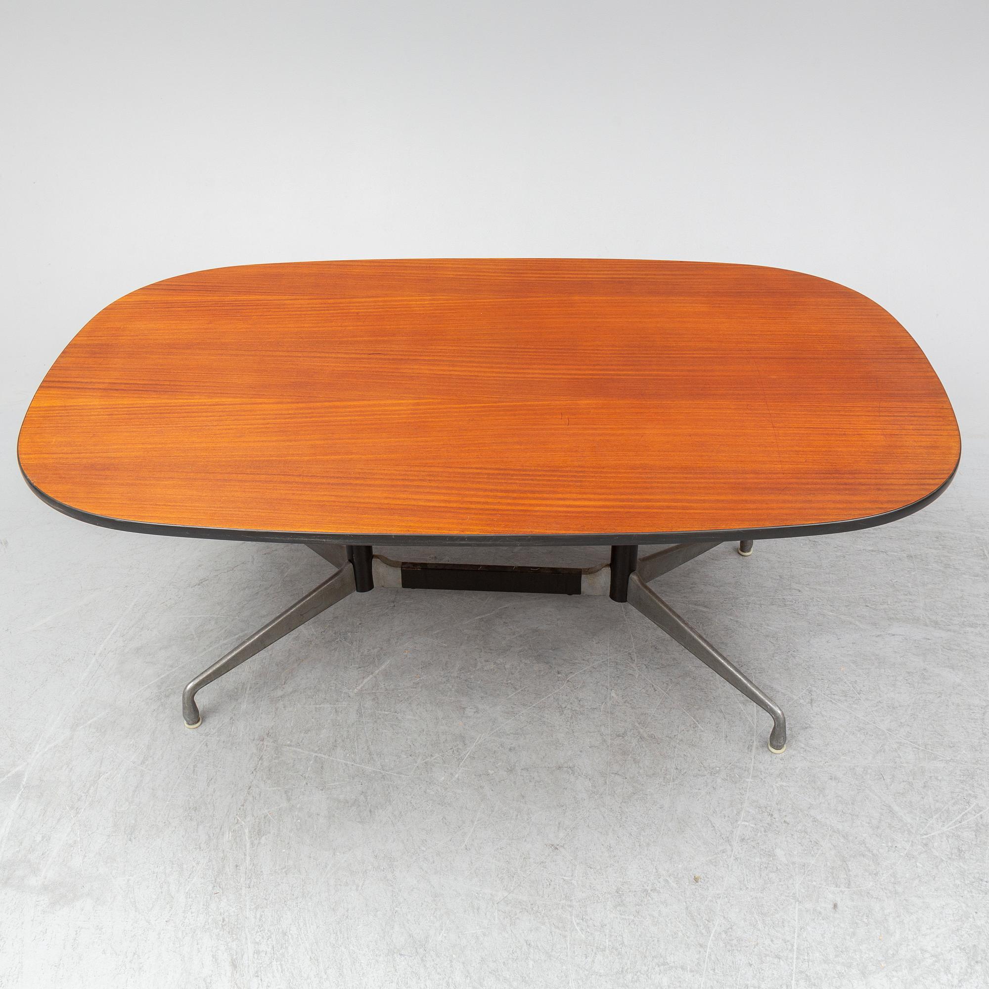 CHARLES AND RAY EAMES, a mahogany veneered table, Herman Miller.