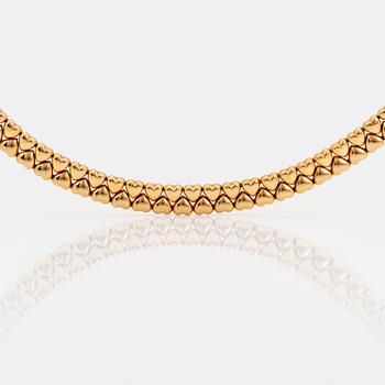 A Cartier necklace "Double Hearts" in 18K gold.