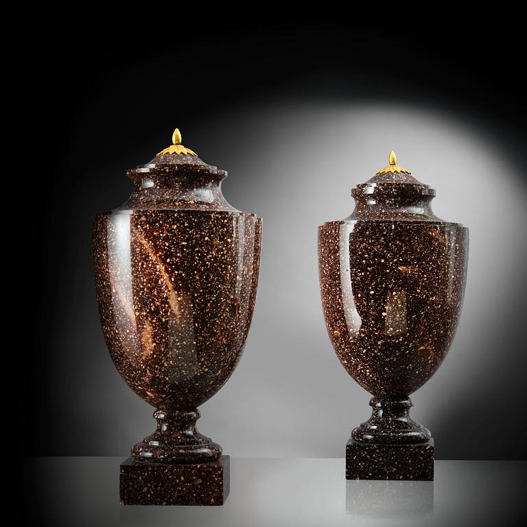 A PAIR OF CAPPED URNS.