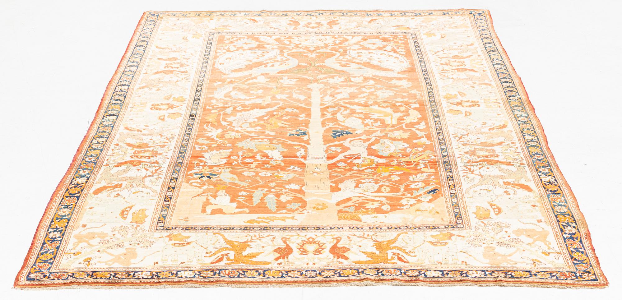 An antique silk Tabriz carpet, north west Persia, c 239 × 168 cm.