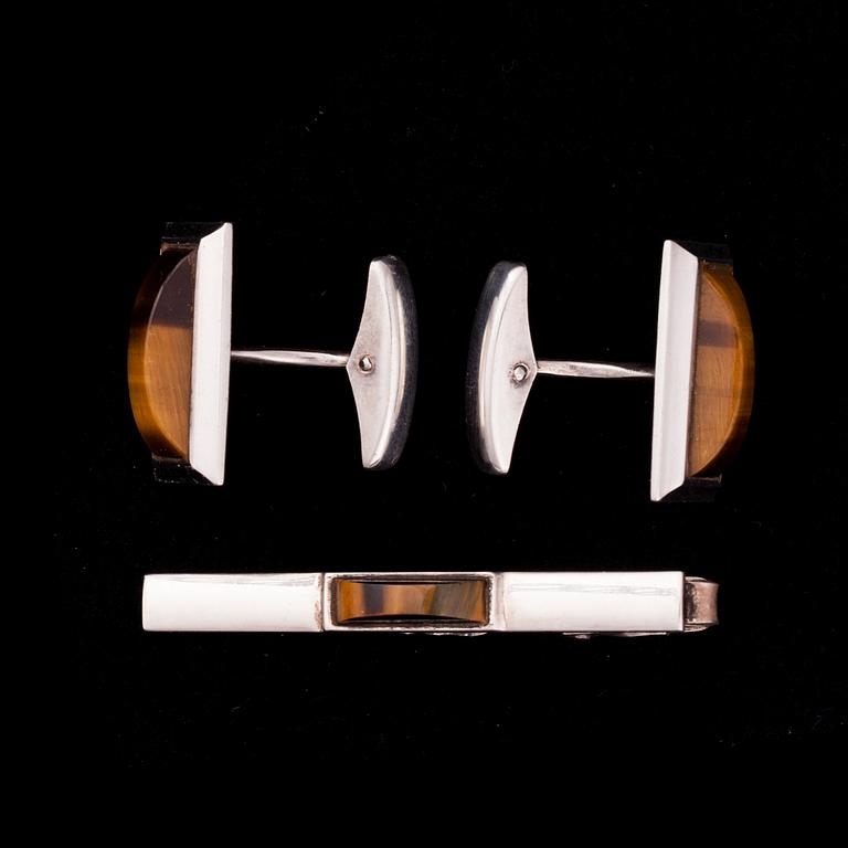 MANSCHETTKNAPPAR och SLIPSNÅL, silver samt tigeröga, Helsingfors 1964.