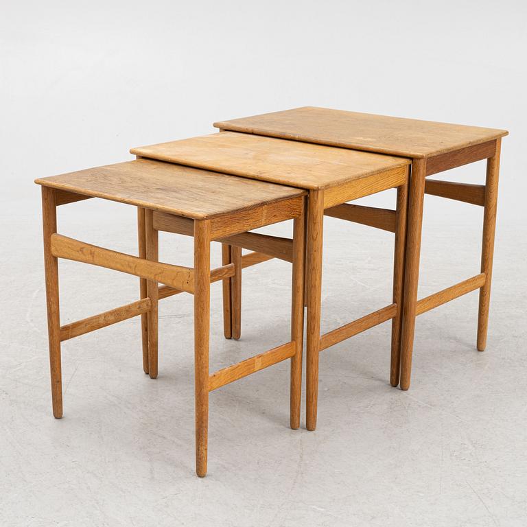 Hans J. Wegner, a nesting table, Andreas Tuck, Denmark, mid 20th Century.