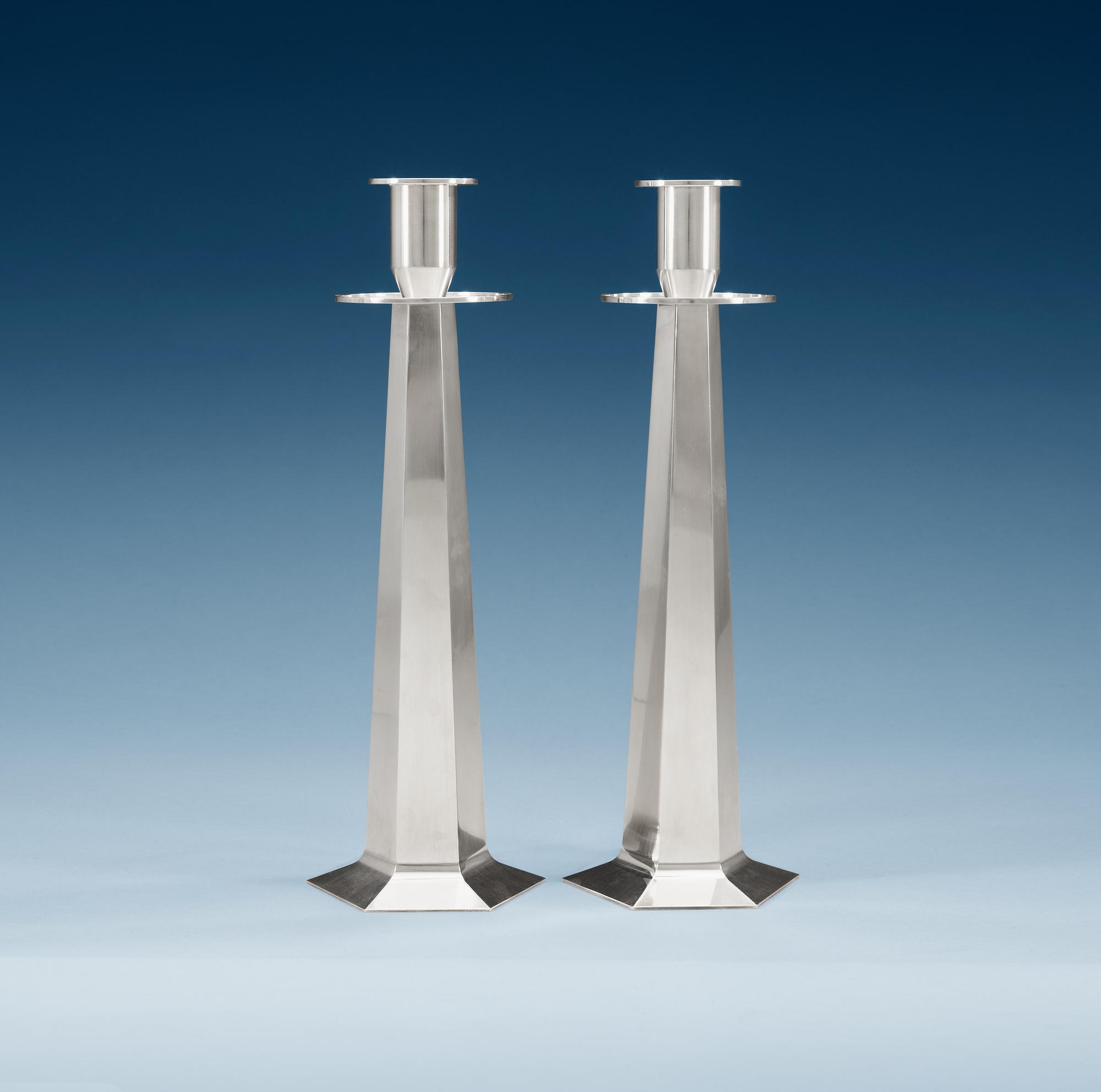 A pair of Wiwen Nilsson sterling candle sticks, Lund 1952 -56.
