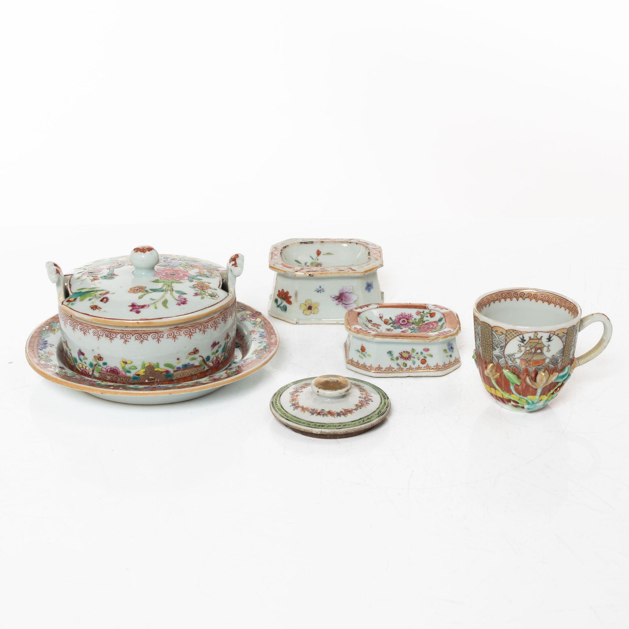 A small Chinese famille rose porcelain tureen with cover and stand, two salt cellars, Qing dynasty, Qianlong (1736-95).