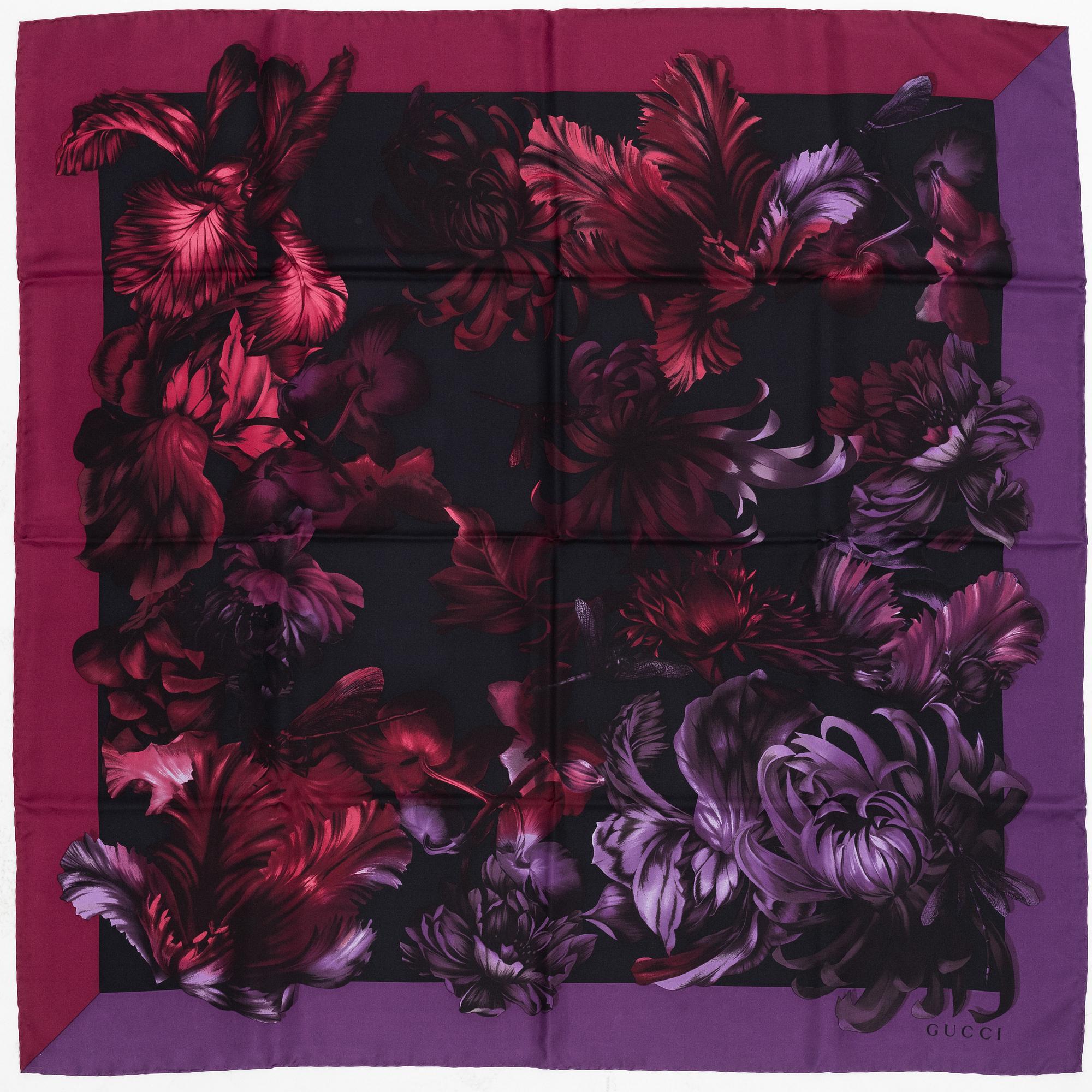 Gucci, a silk scarf.