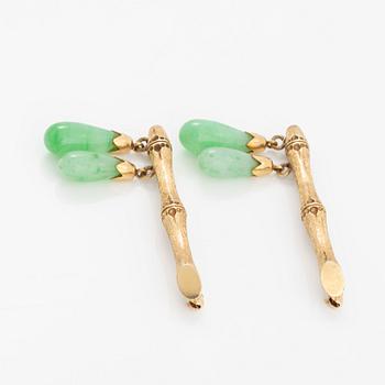 Brooches, a pair, 14K gold in the form of bamboo with jadeite.