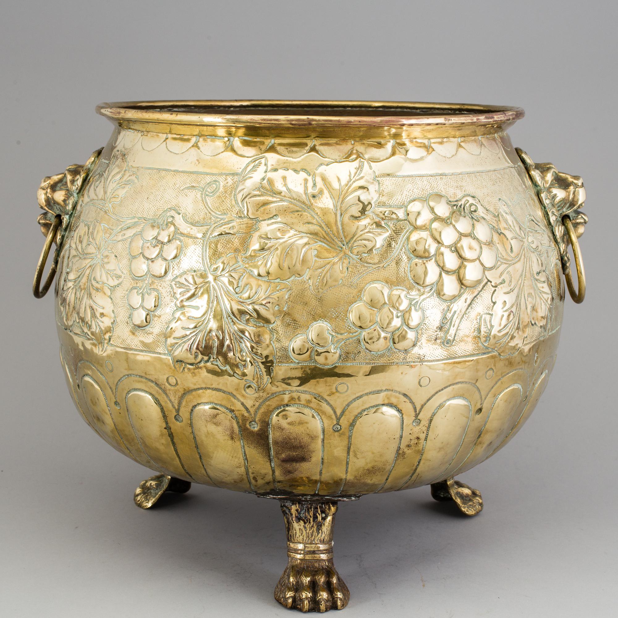 A 19th century brass flower pot.