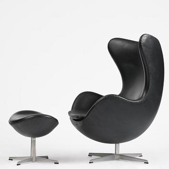 Arne Jacobsen, an "Egg" chair with ottoman, Fritz Hansen, Denmark, 2001.
