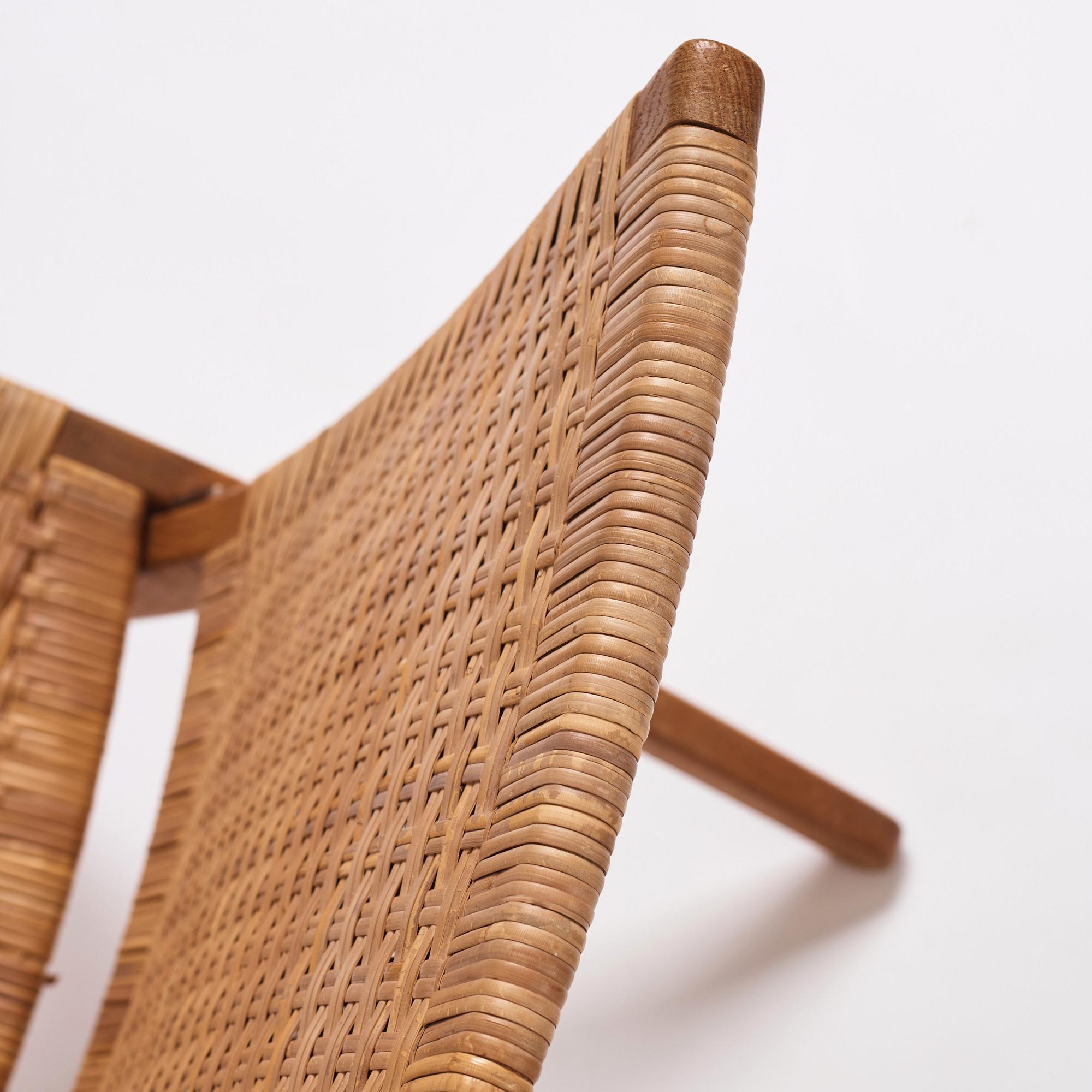 Hans J. Wegner, a pair of oak and rattan folding chairs 'JH-512', Johannes Hansen, Denmark 1950-60s.