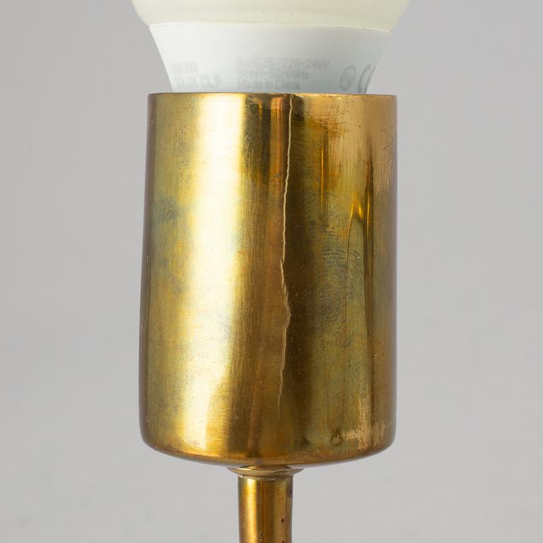 Three brass wall lamps, model 2335 and 2334, by Josef Frank, Firma Svenskt Tenn.