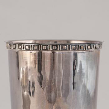 Tapio Wirkkala, a sterling silver bowl, Finland 1973, and Eric Löfman, a silver beaker, MGAB, Sweden 1975.