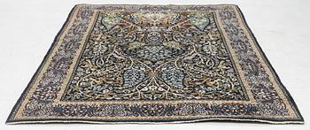 A figural Quum carpet, c. 179 x 125 cm.