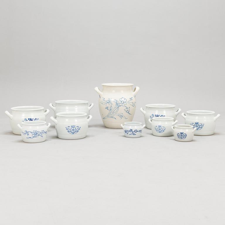 Set of nine ceramic butter jars and a honey urn, Arabia, 1930/40s.