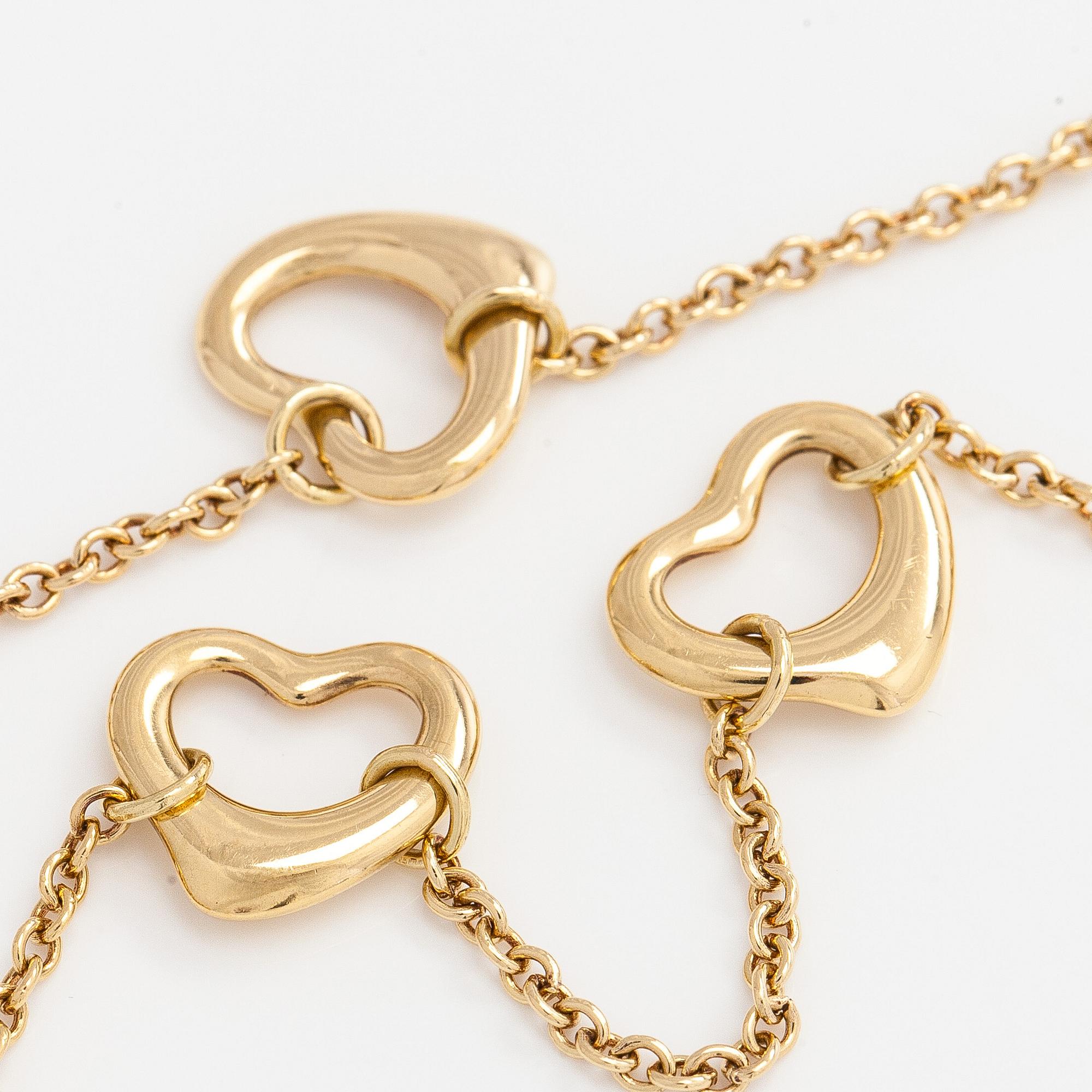 Tiffany & Co, Elsa Peretti, an 18K gold 'Open Heart' bracelet.