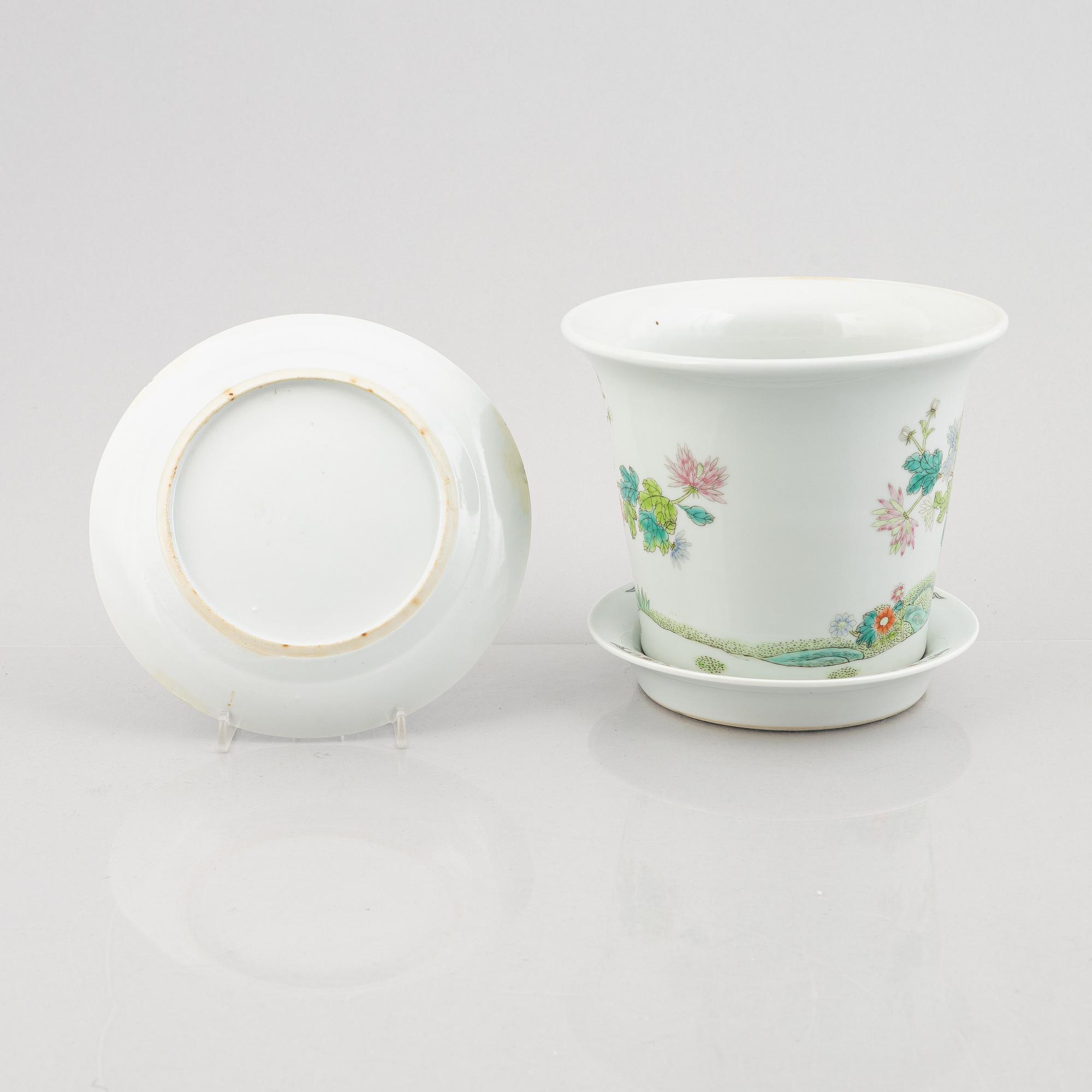 A porcelain plate and a flower pot with stand, China, 19th & 20th century.