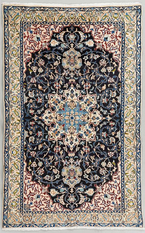 A Nain rug, part silk, 170 x 107 cm.