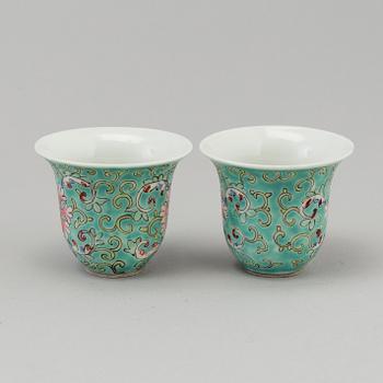 A lot of Chinese turquoise-ground porcelain vases, cups and lidded jars, 20th century.