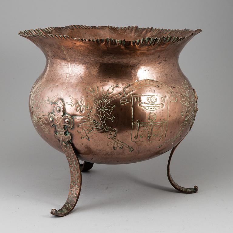 A 19th century copper flower pot.