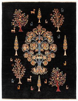A figural oriental Carpet, circa 263 x 201 cm.
