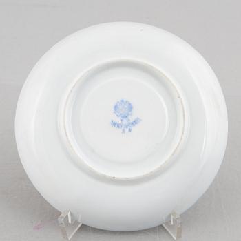 A set of nine porcelain coffee cups with saucers, Kuznetsov, Russia (1891-1917).