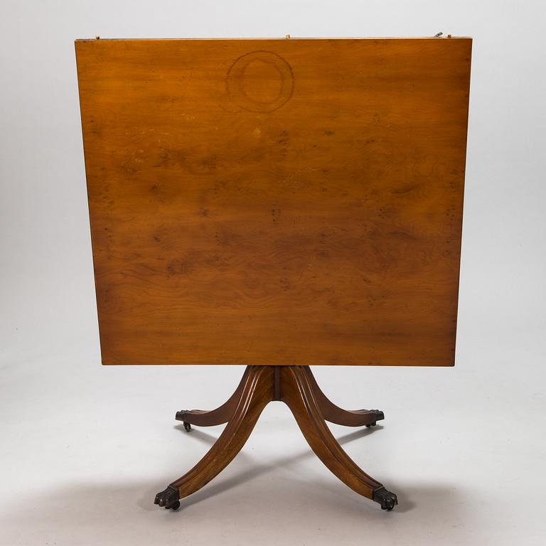 A 20th century English style dining table.